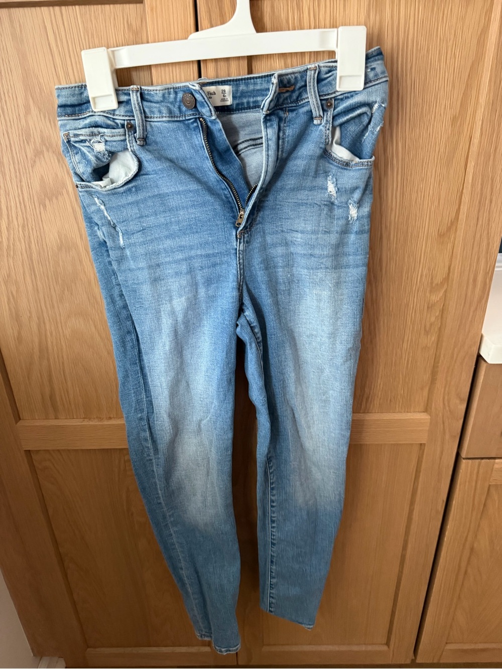Abercrombie Women's Curve Love Light Blue Skinny Jeans with Subtle Distress